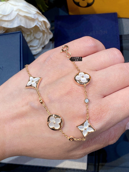 [⭐Corinne]STAR AND SUN 4 MOTIF WHITE MOP PINK GOLD BRACELET