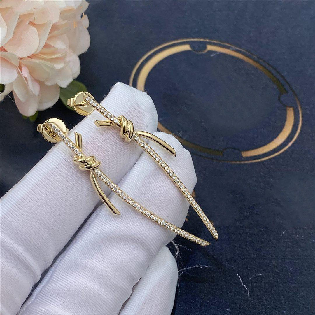 [Corinne]KNOT DROP EARRINGS IN YELLOW GOLD WITH DIAMONDS