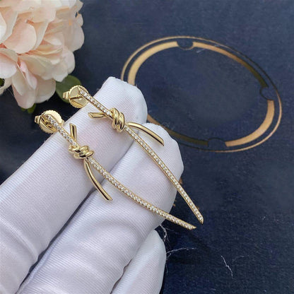 [Corinne]KNOT DROP EARRINGS IN YELLOW GOLD WITH DIAMONDS