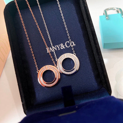 [Corinne]DIAMOND AND MOTHER OF PEARL CIRCLE PENDANT