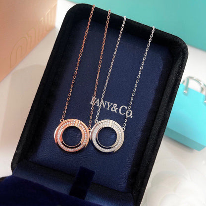 [Corinne]DIAMOND AND MOTHER OF PEARL CIRCLE PENDANT