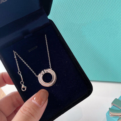 [Corinne]DIAMOND AND MOTHER OF PEARL CIRCLE PENDANT